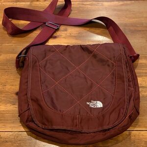 The North Face Dark Red Messenger Bag,thick strap good for travel many pockets